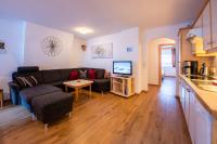 A television and/or entertainment centre at Apartment Bacher