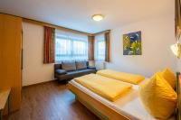 A bed or beds in a room at Apartment Bacher