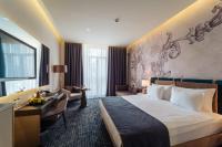 Postel nebo postele na pokoji v ubytování IC Hotels Airport