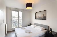 Posteľ alebo postele v izbe v ubytovaní Le Lounge - 2 chambres avec parking