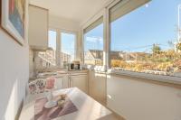 Kuchyň nebo kuchyňský kout v ubytování Apartments Regjo