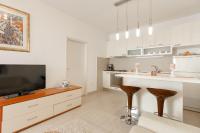 Kuchyň nebo kuchyňský kout v ubytování Apartments Regjo