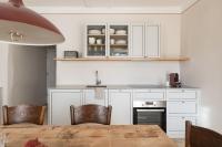 Kuchyňa alebo kuchynka v ubytovaní Smart Suites Kaltern - Apartments am Kalterer See