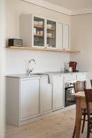 Kuchyňa alebo kuchynka v ubytovaní Smart Suites Kaltern - Apartments am Kalterer See