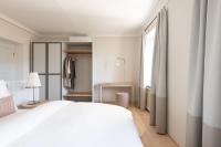 Posteľ alebo postele v izbe v ubytovaní Smart Suites Kaltern - Apartments am Kalterer See