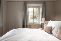 Posteľ alebo postele v izbe v ubytovaní Smart Suites Kaltern - Apartments am Kalterer See