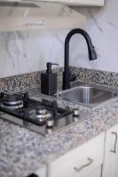 Kuchyň nebo kuchyňský kout v ubytování Cozy Suite 8 en la Zona Colonial