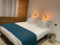 Posteľ alebo postele v izbe v ubytovaní Appart Hôtel Le JAS