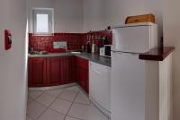 Kuchyň nebo kuchyňský kout v ubytování Vis a Vis Apartments