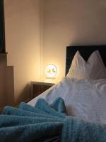 Posteľ alebo postele v izbe v ubytovaní Ruyi holiday -Családi ház