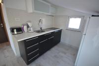 Kuchyňa alebo kuchynka v ubytovaní Apartment Boticki