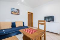 TV a/nebo společenská místnost v ubytování Apartments Hrskanovic