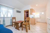 Kuchyň nebo kuchyňský kout v ubytování Apartments Hrskanovic