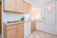 Kuchyň nebo kuchyňský kout v ubytování Apartments Hrskanovic