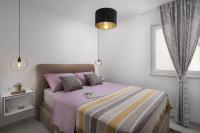 Posteľ alebo postele v izbe v ubytovaní Apartments Vista Exclusive