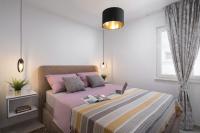 Posteľ alebo postele v izbe v ubytovaní Apartments Vista Exclusive
