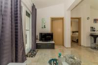 Televízia a/alebo spoločenská miestnosť v ubytovaní Apartments Stichling