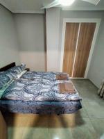 Postel nebo postele na pokoji v ubytování Apartament Goleta