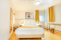 Postel nebo postele na pokoji v ubytování Hotel Viella