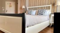 Posteľ alebo postele v izbe v ubytovaní MD Modern Hotel - Jardines