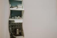 A kitchen or kitchenette at Maravigghia Palermo Rooms