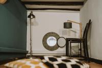 A bed or beds in a room at Maravigghia Palermo Rooms