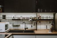 A kitchen or kitchenette at Maravigghia Palermo Rooms