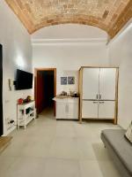 A television and/or entertainment centre at Case Baldelli La Chiostrina
