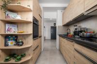 Kuchyňa alebo kuchynka v ubytovaní Apartman Arba