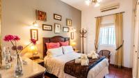 A bed or beds in a room at Casa Campo La Capilla Los Palacios y Villafranca by Ruralidays
