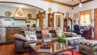 A seating area at Casa Campo La Capilla Los Palacios y Villafranca by Ruralidays