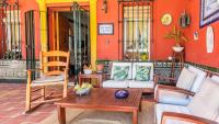 A seating area at Casa Campo La Capilla Los Palacios y Villafranca by Ruralidays