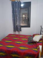 A bed or beds in a room at Deltebre Riu