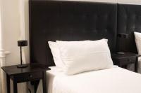 A bed or beds in a room at IM Apartments - Appartamento in zona Piazza Repubblica - Centrale