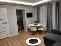 Televízia a/alebo spoločenská miestnosť v ubytovaní Central Platinum Apartments 14