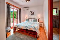 Posteľ alebo postele v izbe v ubytovaní Pool Villa Abbazia Seaview - Happy Rentals