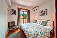 Posteľ alebo postele v izbe v ubytovaní Pool Villa Abbazia Seaview - Happy Rentals