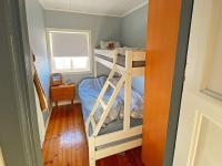 Postel nebo postele na pokoji v ubytování Holiday home byrknesøy