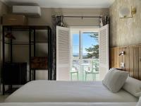 Posteľ alebo postele v izbe v ubytovaní Alameda Hostal Boutique