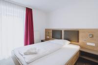 Łóżko lub łóżka w pokoju w obiekcie Appartements Sulzer by we rent, SUMMERCARD INCLUDED