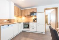Kuchnia lub aneks kuchenny w obiekcie Appartements Sulzer by we rent, SUMMERCARD INCLUDED