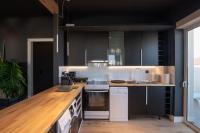 A kitchen or kitchenette at City's Best-Kept Secret, Eclectic & Luxe Getaway