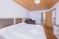 Łóżko lub łóżka w pokoju w obiekcie Appartements Sulzer by we rent, SUMMERCARD INCLUDED