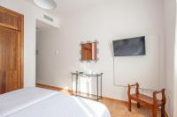 Łóżko lub łóżka w pokoju w obiekcie Hotel Rural El Castillejo