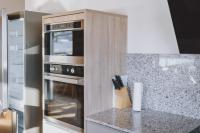 Kuchnia lub aneks kuchenny w obiekcie Appartements Sulzer by we rent, SUMMERCARD INCLUDED
