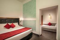 Posteľ alebo postele v izbe v ubytovaní Navona Colors Hotel