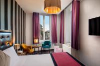Posteľ alebo postele v izbe v ubytovaní Navona Colors Hotel