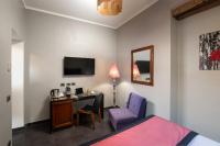 Posteľ alebo postele v izbe v ubytovaní Navona Colors Hotel