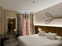 Posteľ alebo postele v izbe v ubytovaní Alameda Hostal Boutique