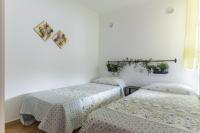 Posteľ alebo postele v izbe v ubytovaní Home2Book Terrace&Pool Apartment Playa del Inglés